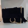 Bolso piel negro y dorado